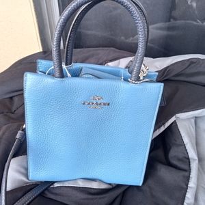 Small designer Coach clutch purse